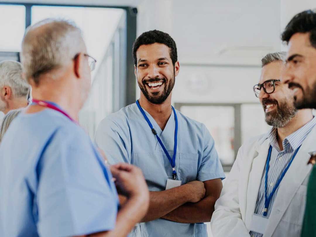 nurses and doctors talking